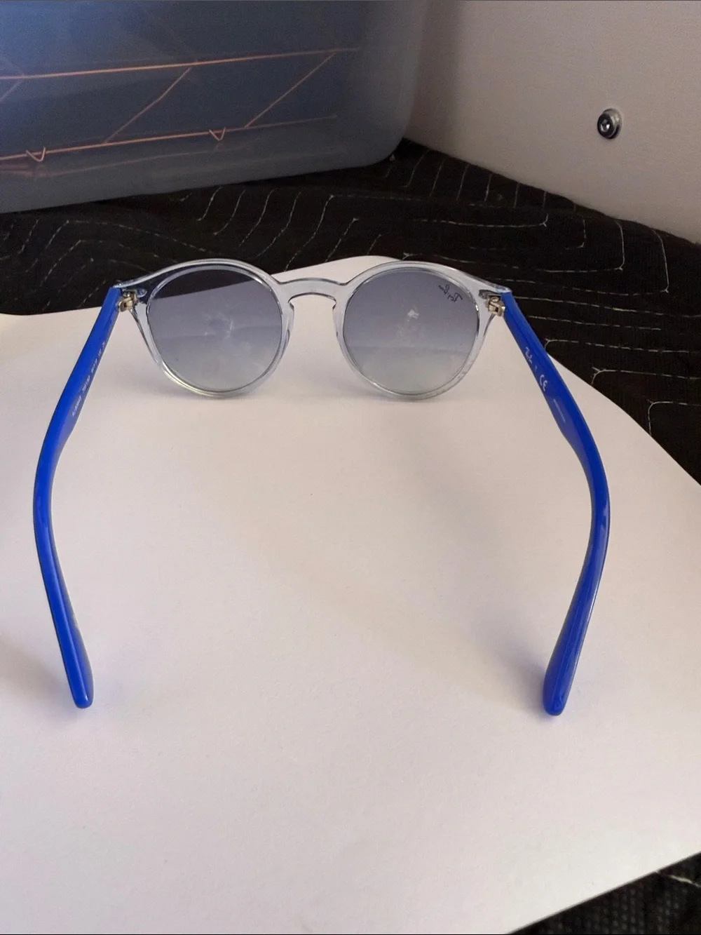 Ray-Ban Clear Frame Sunglasses with Blue Temples and Mirrored Lenses